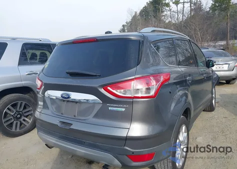 2014 Ford Escape Titanium z USA, uszkodzony, nr VIN 1FMCU0J93EUA39918